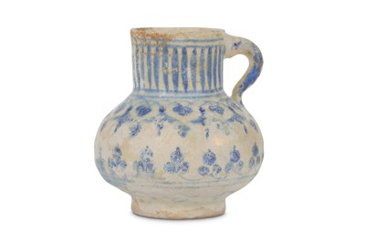 Lot 154 - A TIMURID BLUE AND WHITE POTTERY JUG Iran or...