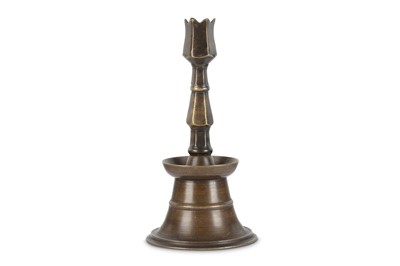 Lot 113 - A BRONZE CANDLESTICK  Ottoman Turkey, 18th...