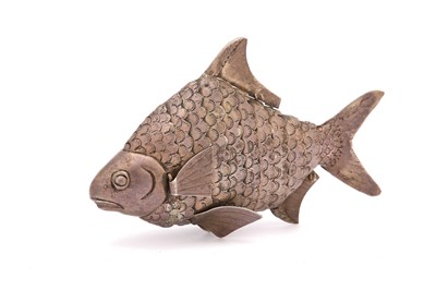Lot 10 - A modern white metal articulated fish, stamped...