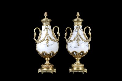 Lot 131 - A PAIR OF LOUIS XVI STYLE GILT BRONZE AND...