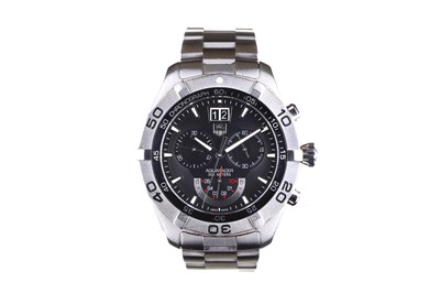 Lot 27 - Tag Heuer. A stainless steel quartz calendar...