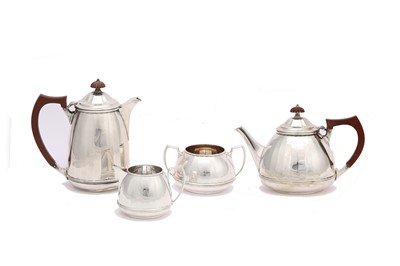 Lot 290 - A George V sterling silver four-piece tea...
