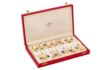 Lot 189 - A cased set of twelve Danish silver-gilt and...