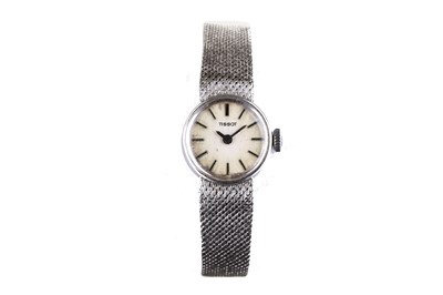 Lot 70 - Tissot. A 9K white gold manual wind bracelet...