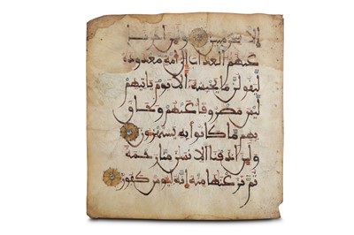 Lot 34 - A LOOSE FOLIO FROM A MAGHRIBI QUR'AN  North...