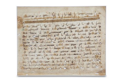 Lot 28 - A KUFIC QUR'AN FOLIO ON VELLUM Abbasid Near...