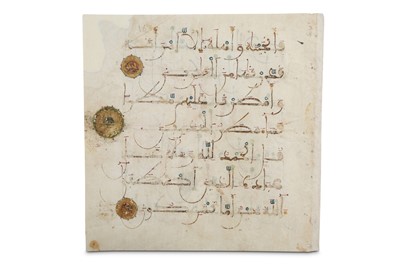 Lot 35 - A LOOSE FOLIO FROM AN ANDALUSIAN QUR'AN ...