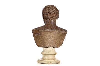 Lot 36 - AN ITALIAN CARVED PORPHYRY BUST OF A YOUNG...