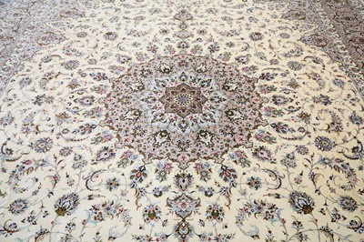 Lot 26 - AN EXTREMELY FINE SIGNED SILK KASHAN CARPET,...
