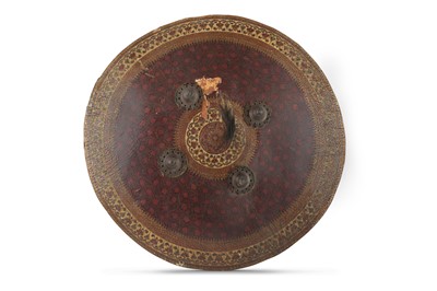 Lot 251 - A LACQUERED RAWHIDE SHIELD (DHAL) Kashmir,...