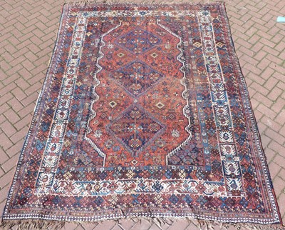 Lot 428 - An antique Persian hand made Qashqai carpet,...