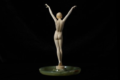 Lot 17 - A FRENCH ART DECO PERIOD CARVED IVORY FIGURE...