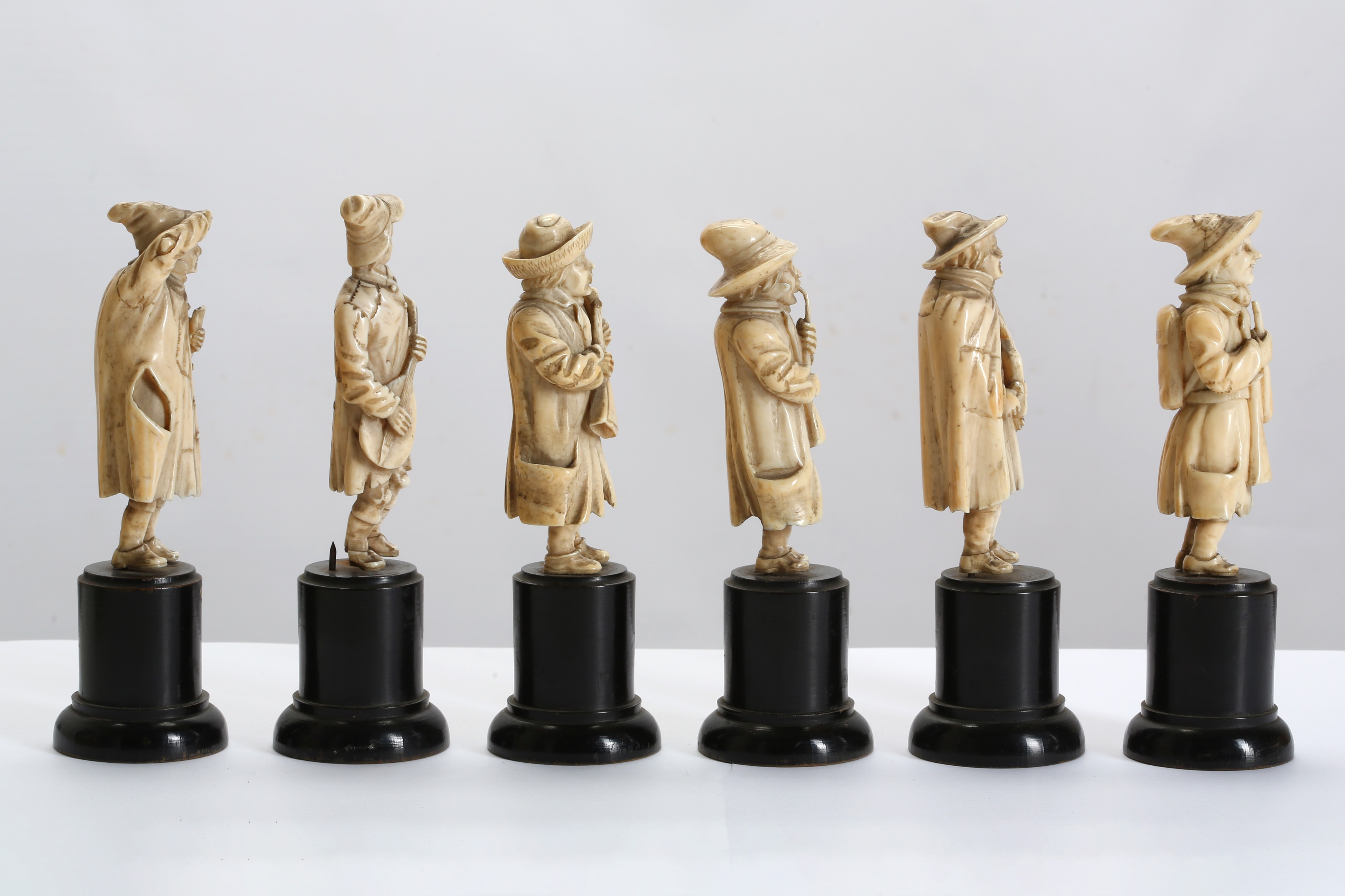 Lot 40 - A SET OF SIX LATE 19TH CENTURY CARVED IVORY