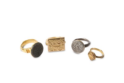 Lot 158 - A SELECTION OF FOUR IRANIAN RINGS Iran and...