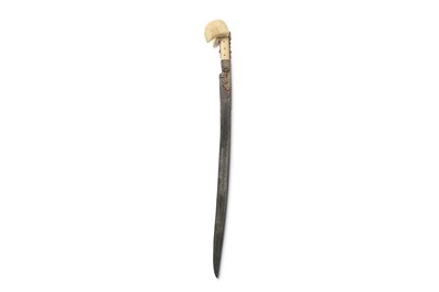 Lot 128 - A LARGE-EARED WALRUS IVORY-HILTED YATAGHAN...