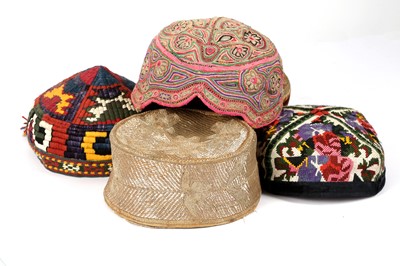 Lot 117 - FIVE CENTRAL ASIAN TRIBAL HATS South and...