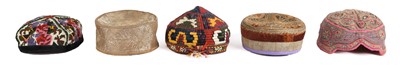 Lot 117 - FIVE CENTRAL ASIAN TRIBAL HATS South and...