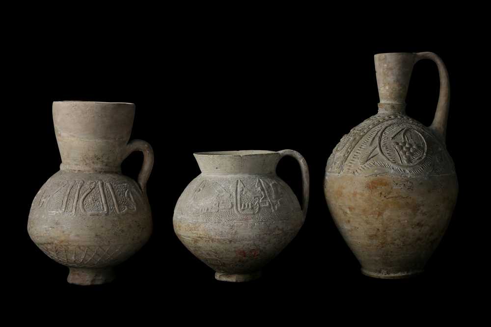 Lot 6 - THREE UNGLAZED POTTERY WATER VESSELS  Possibly...