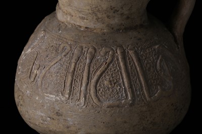 Lot 6 - THREE UNGLAZED POTTERY WATER VESSELS  Possibly...