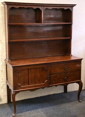 Lot 423 - An oak dresser the super structure with ogee...