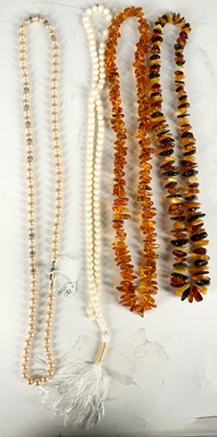 Lot 445 - Four mixed necklaces to include: two amber, a...