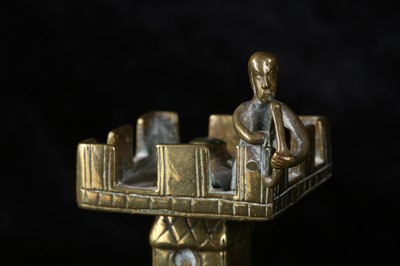 Lot 110 - A MAGDEBURG STYLE BRONZE CANDLESTICK IN THE...