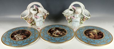 Lot 449 - Two porcelain baskets with figures of children...