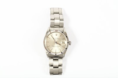 Lot 360 - Rolex. A stainless steel automatic calendar...