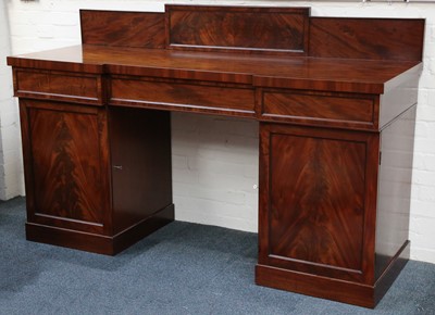 Lot 398 - A Regency flame mahogany breakfront sideboard...