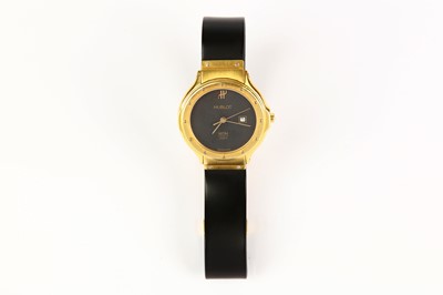 Lot 382 - Hublot. An 18K gold quartz calendar wristwatch....