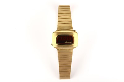 Lot 355 - Wittnauer. A gold plated quartz digital...