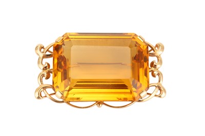 Lot 322 - A citrine brooch, the large step-cut citrine,...