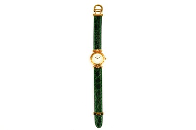 Lot 386 - Tabbah. An 18K yellow gold quartz wristwatch....