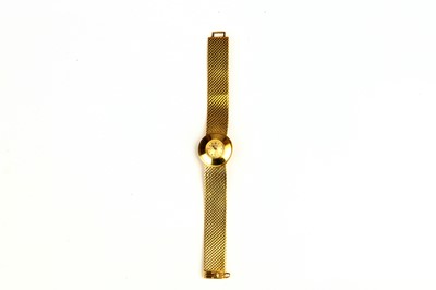 Lot 397 - Omega. A vintage 18K gold manual wind bracelet...