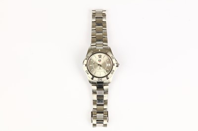 Lot 352 - Tag Heuer. A stainless steel quartz calendar...