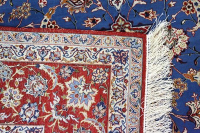Lot 19 - A VERY FINE PART SILK SIGNED ISFAHAN CARPET,...