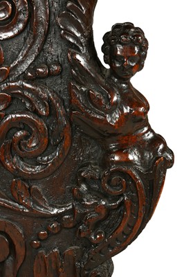 Lot 128 - A 16TH CENTURY AND LATER FRENCH CARVED WALNUT...