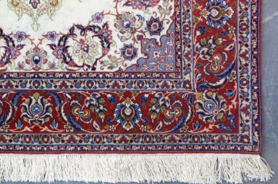 Lot 27 - AN EXTREMELY FINE PART SILK ISFAHAN RUG,...