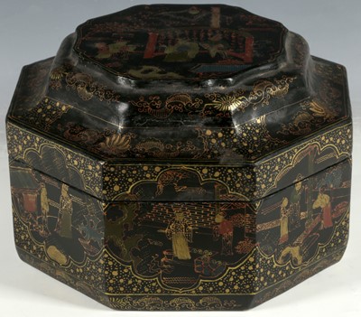 Lot 452 - An octagonal section gilt decorated black...