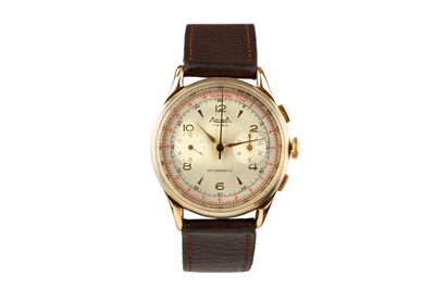 Lot 420 - Onger. An 18K gold manual wind chronograph...