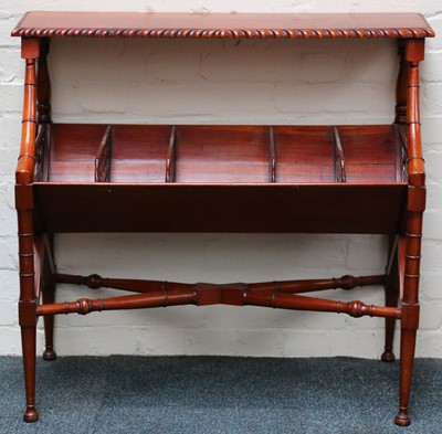 Lot 437 - A contemporary mahogany book trough, gadrooned...