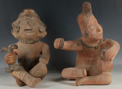 Lot 388 - A pair of 20th Century terracotta Aztec...