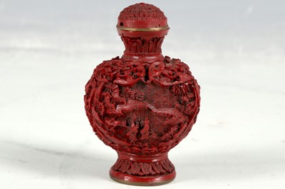 Lot 405 - A Chinese red snuff bottle, globular,...