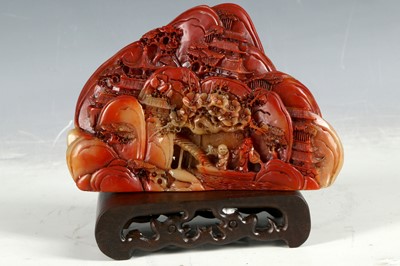 Lot 446 - A Chinese Shoushon stone, landscape carving...