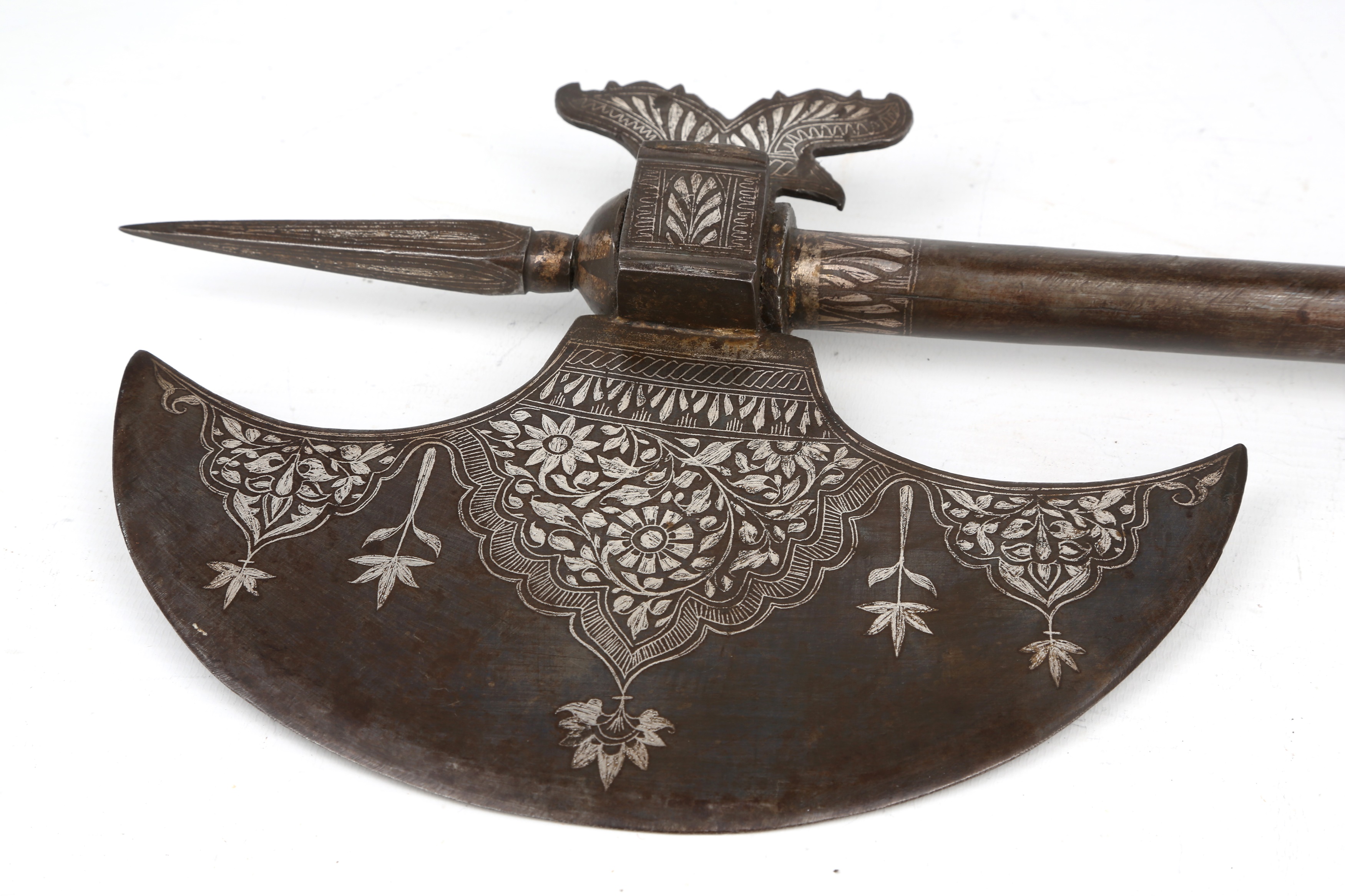 Lot 193 - A QAJAR SILVER-INLAID CEREMONIAL AXE (TABAR)