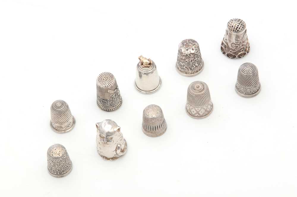 Lot 13 - A mixed group of sterling silver thimbles,...