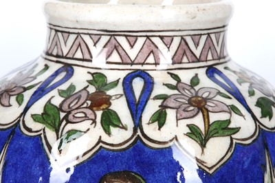Lot 131 - A QAJAR POTTERY VASE WITH FIGURAL DECORATION...
