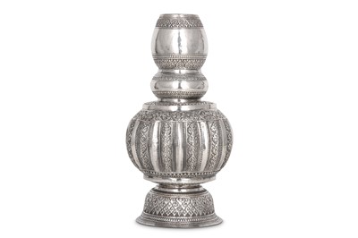 Lot 99 - A 20th century Cambodian unmarked silver bottle or vase, circa 1900-1950