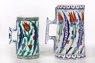 Lot 103 - TWO IZNIK-STYLE POTTERY TANKARDS  Florence,...