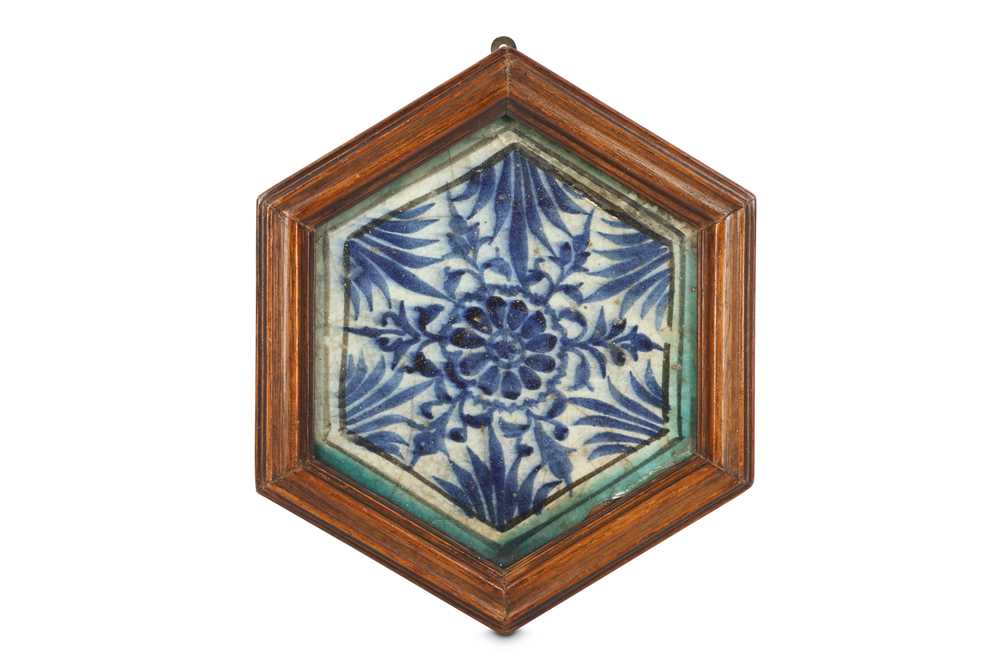 Lot 55 - A MAMLUK HEXAGONAL POTTERY TILE Damascus,...